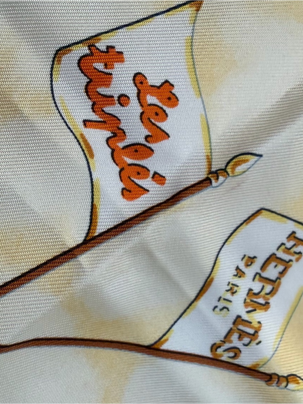 Hermès Cream and Orange Silk Scarf with Green Accent